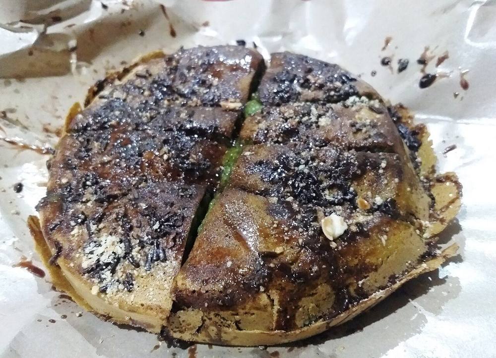 Martabak terang bulan, the Indonesian cousin of apam balik
