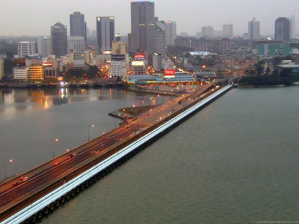 The Johor-Singapore Causeway at dusk, seen across the Straits of Johor
