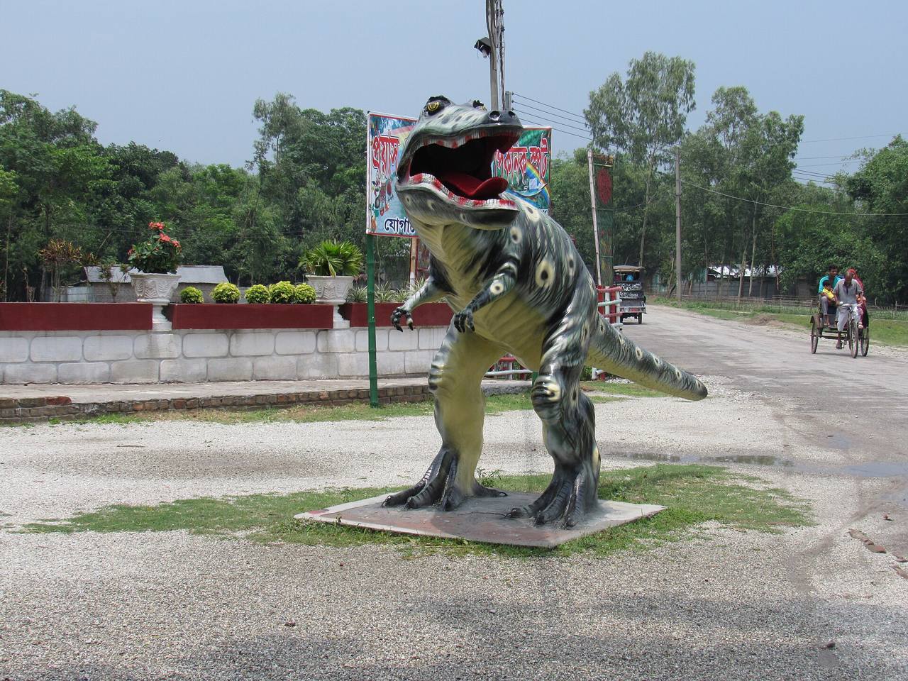A roaring T-Rex dinosaur model, the dinosaur attraction theme near KSL