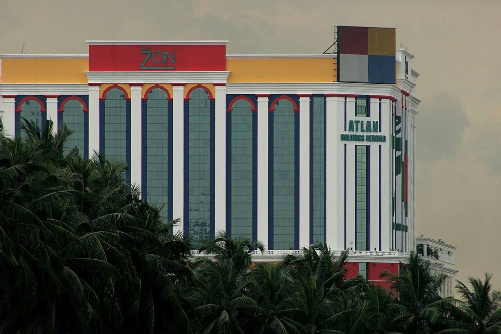 The ZON building facade in Johor Bahru seen above palm trees