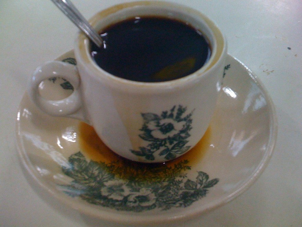 A cup of traditional kopi-O black coffee, the quintessential Malaysian kopitiam drink