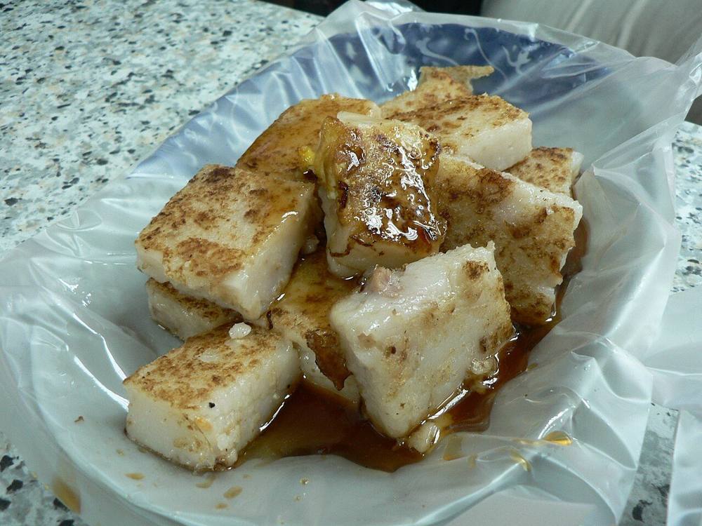 Pan-fried slices of radish cake, also called carrot cake in Malaysia