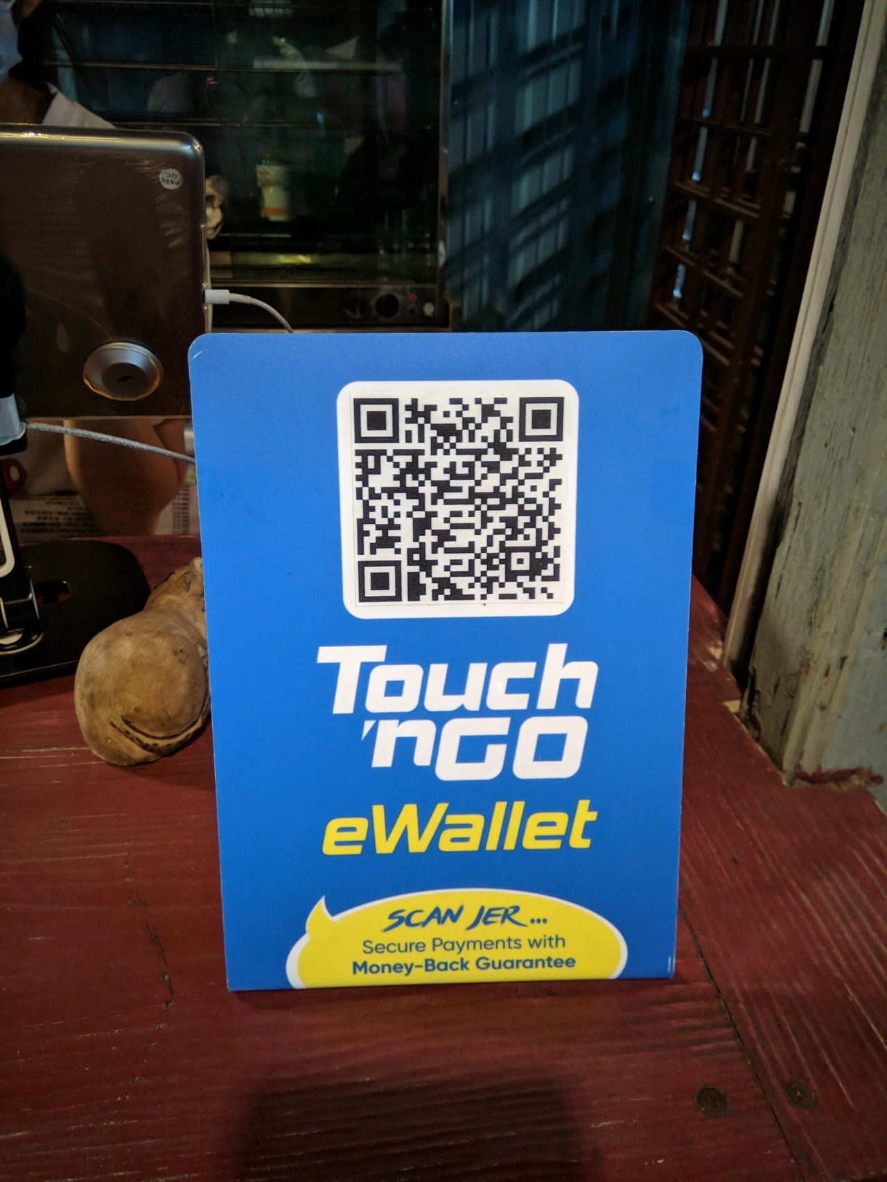 A Touch 'n Go tap-and-go terminal at a Malaysian entry point